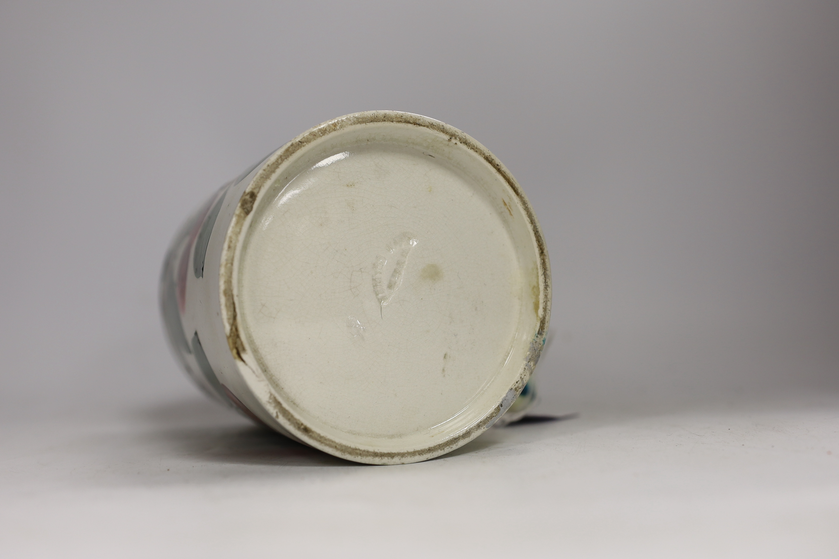 A Wemyss mug with cherry decoration (restored a.f.), 14cm high